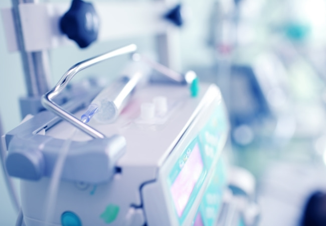 Defocused Health Background with Electronic Medical Device